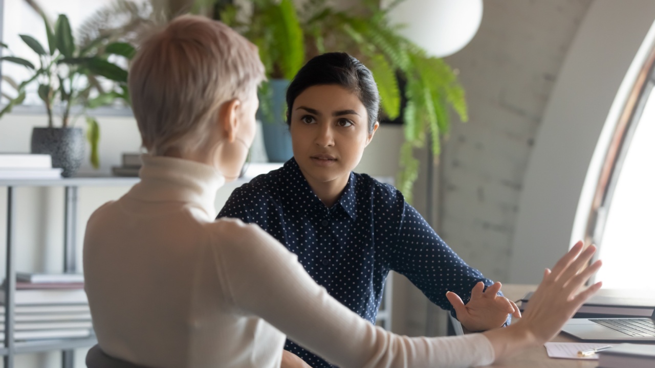 Manager and employee discussing performance issue